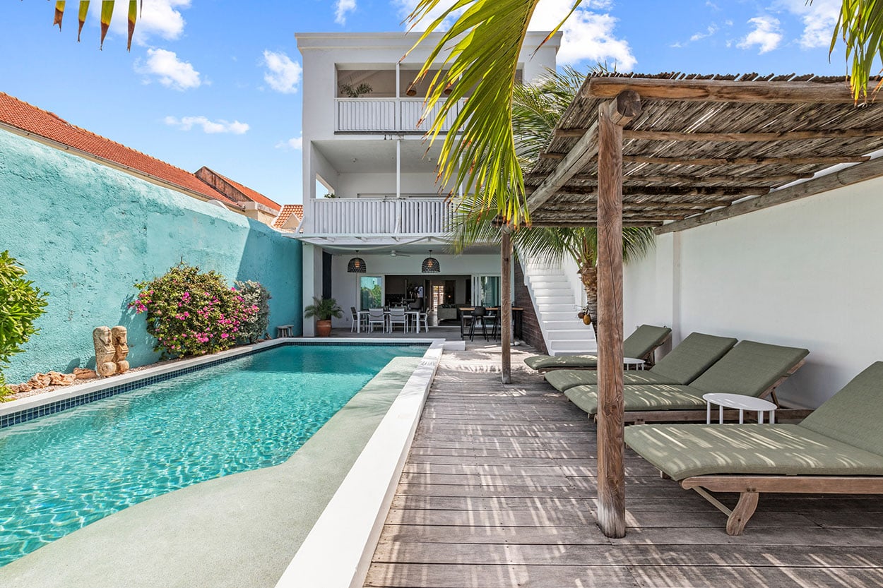 Terrace and pool along the house