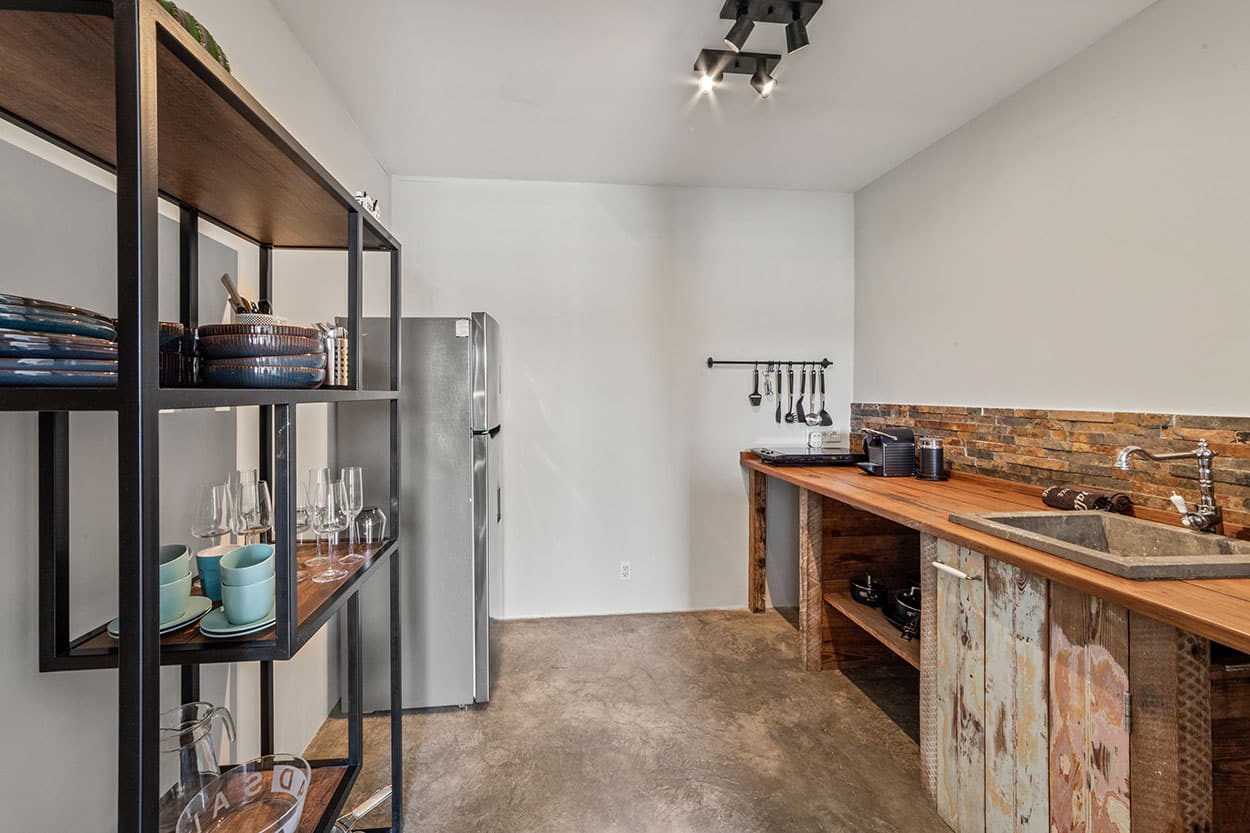 Open kitchenette with dining table